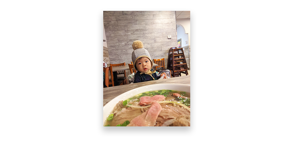 Photo of bowl of pho and Jennifer's son